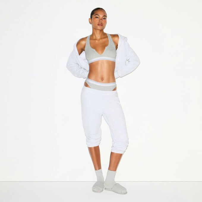 BRALETTE MED RUBBAD BOMULL MED DELAD HALSNING