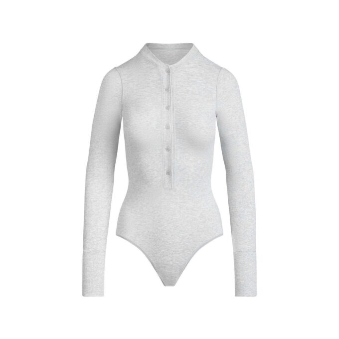 Henley-body i bomullsjersey med djup urringning Henley-body i bomullsjersey med djup urringning