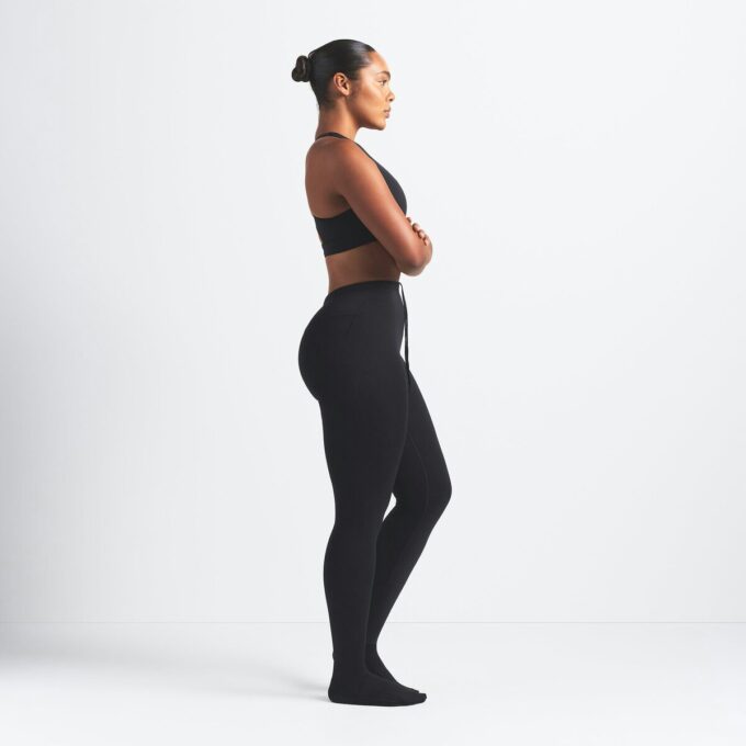NikeSKIMS MATT FOOTSIE GRIP LEGGINGS NikeSKIMS MATT FOOTSIE GRIP LEGGINGS
