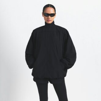 NikeSKIMS VÄVD NYLON OVERSIZED TRÄNINGSJACKA