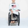 SKIMS FÖR USA:S BOMULLSRIBBADE PARALYMPISKA T-SHIRT MINIKLÄNNING