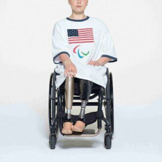 SKIMS FÖR USA:S BOMULLSRIBBADE PARALYMPISKA T-SHIRT MINIKLÄNNING SKIMS FÖR USA:S BOMULLSRIBBADE PARALYMPISKA T-SHIRT MINIKLÄNNING