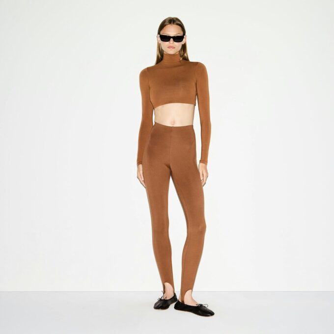 THE ESSENTIAL COLLECTION HÖGMIDDAD STIRRUP LEGGINGS