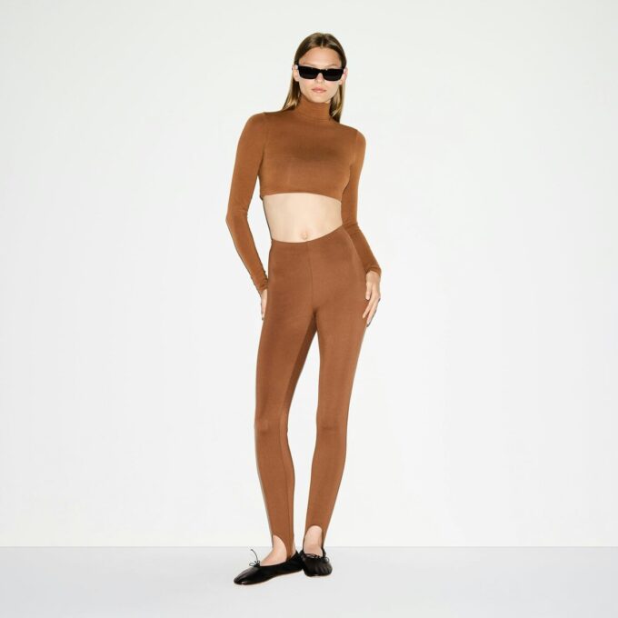 THE ESSENTIAL COLLECTION HÖGMIDDAD STIRRUP LEGGINGS